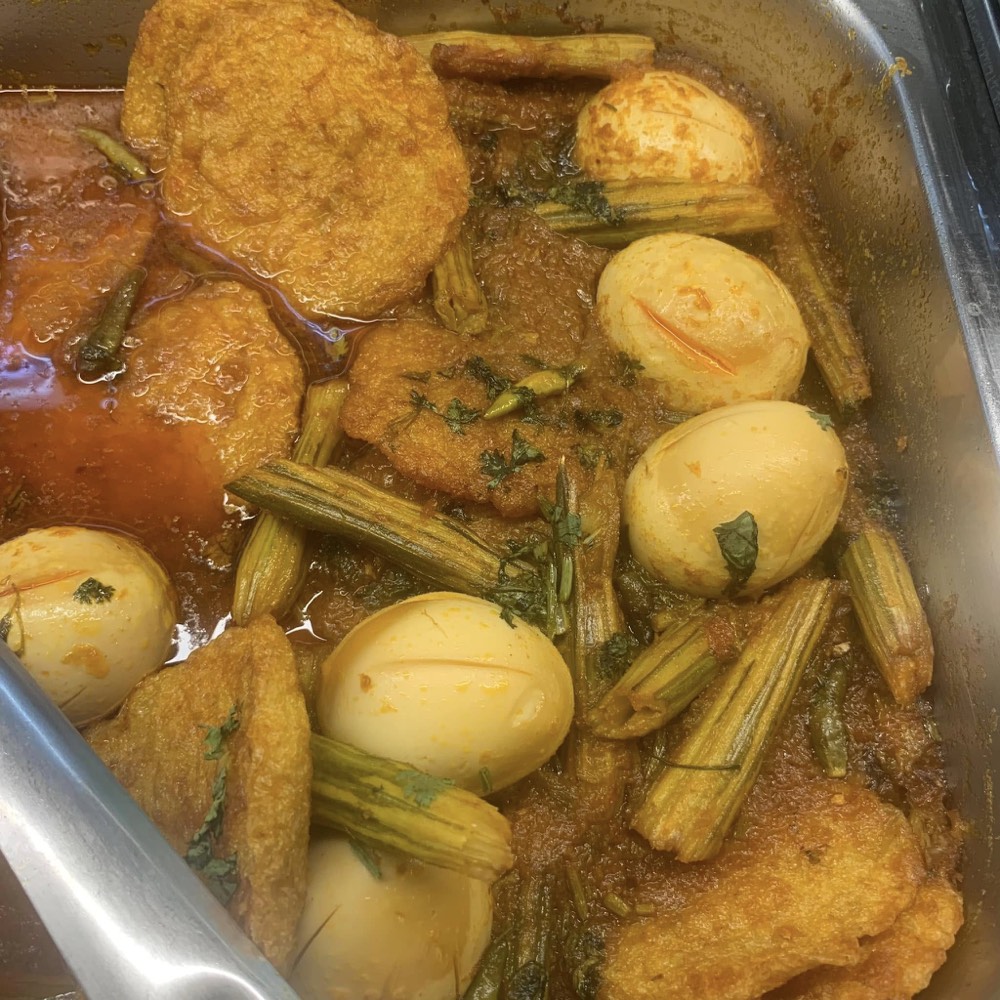 Egg and drumstick curry in rich masala