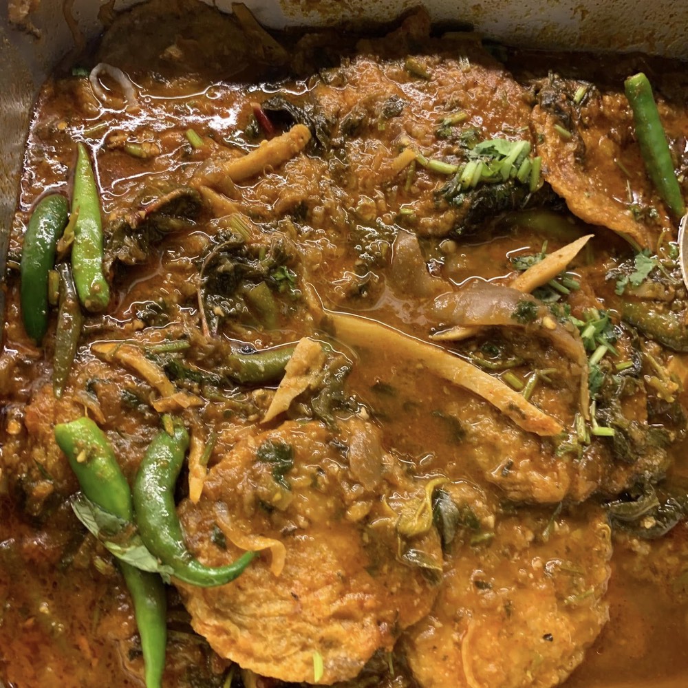 Burmese fish curry with green chilli and herbs